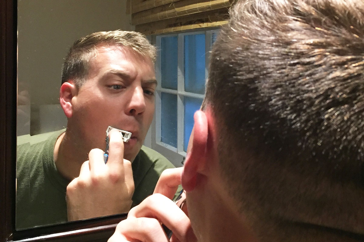 Dollar Shave Club: A man mid-shave
