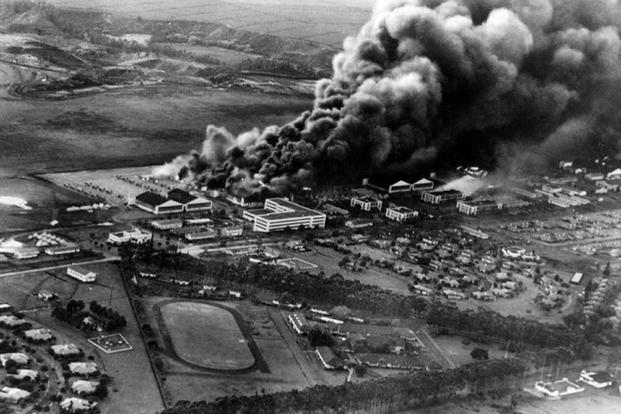 Planes and hangars burning at Wheeler Army Base during the Japanese attack on Pearl Harbor, Hawaii, Dec. 7, 1941. (U.S. Navy)