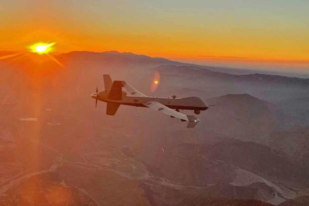 An MQ-9 Reaper views the smoky San Gabriel Mountains.