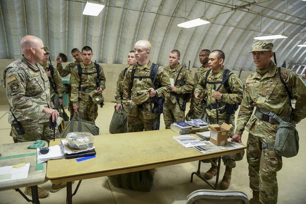 Tech. Sgt. James May, 319th Training Squadron Primary Agile Combat Employment Range, Forward Operations Readiness General Exercise cadre, guides trainees through the first phase of PACER FORGE at Joint Base San Antonio-Chapman Training Annex, Texas.