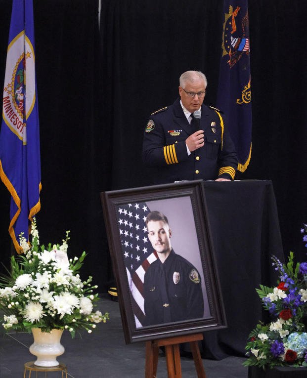 Fargo Police Chief David Zibolski speaks during funeral services.