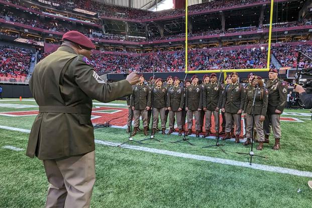 82nd Airborne Division Chorus performs "God Bless America" at halftime