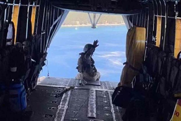 (Sgt. Alec Langen, courtesy Langen family) "Alec is sitting on the back of a CH-53 over the ocean and he's waving back at the camera and we just prefer to think of him as saying, ‘I’m OK and you’ve got this and you’re fine and I’m OK,’ Caryn Langen told Military.com