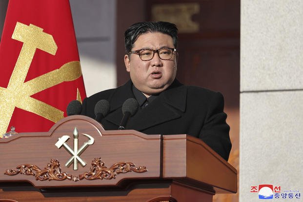 North Korea's leader Kim Jong Un speaks during an event.