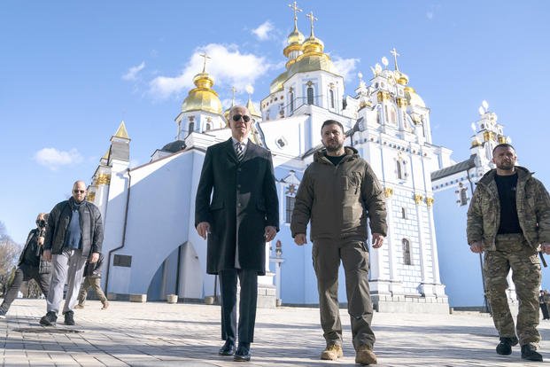 U.S. President Joe Biden walks with Ukrainian President Volodymyr Zelenskyy