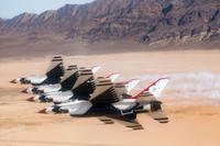 The Thunderbirds Diamond formation pilots perform the Echelon Pass in Review maneuver over the Nevada Test and Training Range during a training flight, Jan. 29, 2018. (U.S. Air Force photo/Christopher Boitz)