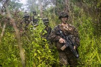 U.S. Marines run a patrol exercise in Malaysia.