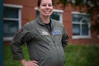 Lt. Cmdr. Jacqueline Nordan poses in the first Navy maternity flight suit.