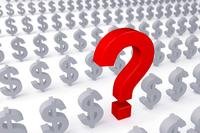 Question mark set amid dollar signs