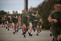 Marine recruits run during an initial strength test.