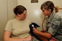 An airman's blood pressure is checked.