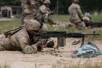 An Army reservist fires a M240B automatic machine gun