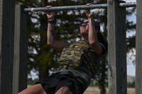 A participant in the Murph Challenge performs the pull-up portion of the exercise at Fairchild Air Force Base, Washington.
