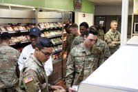 Soldiers with the 3rd Infantry Division shop at the Culinary Outpost Kiosk at Fort Stewart, Ga.