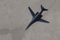 A B-1B Lancer disengages from a KC-135 Stratotanker
